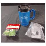 Coffee cup, mini baking cups, and a hand shredder