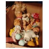 Vintage baby dolls and toys