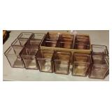 Purple glass candle holders. 17 total. 2 1/2 x 3