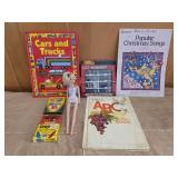 Die cast car set, books, crayons, doll