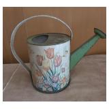 vintage tin litho watering can produced by the