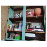 Cabinet contents - butter mold, electric skillet,