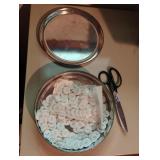 Vintage buttons in a metal tin can and Singer