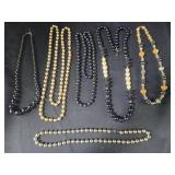 Group of Black and Golden Beaded Necklaces