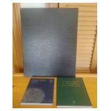 Commemorative coin books. Includes 10 quarters