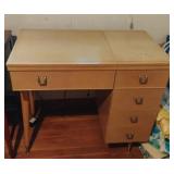 Vintage Kenmore sewing machine with accessories