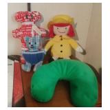 Plush dolls and a neck pillow