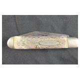 vintage KA-BAR folding pocket knife featuring a