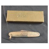 vintage gold-filled pocket knife featuring a