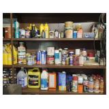 Shelves include chain oil, brake fluid, degreaser