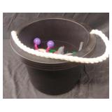 Small pail with top handles and small toys