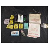 Assorted vintage lighters, flints, and more