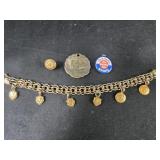 Bracelet with Firestone Service charms and other