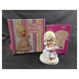 Precious Moments figurine is the "I