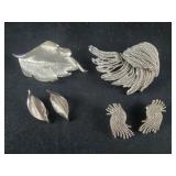 Two Silver colored Brooches with matching clip-on