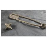 Antique metal jack and oversized pin