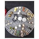Group of petite pierced earrings (on a holder