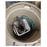 Rubbermaid Roughneck 33 gal trashcan with a water