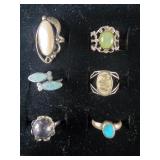 Six Silver colored Rings
