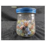 Jar of vintage marbles