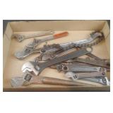 Adjustable wrenches