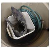 Rubbermaid Roughneck 33 gal trashcan with a water