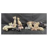 Assorted cat figurines and shelf sitters