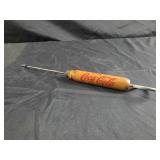 vintage Coca-Cola advertising ice pick with a