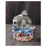 Dolphin musical snow globe. Music doesn't play