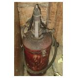 Vintage red Bennett Lubester hand-crank oil or