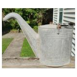 Galvanized steel watering can
