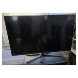 48' Samsung TV powers on with remote and  tv