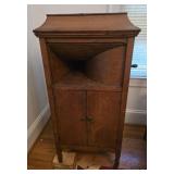 vintage Brunswick phonograph cabinet features a