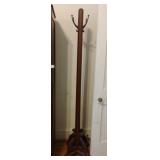 Wooden coat rack on wheels 70' tall