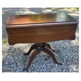Vintage mahogany pedestal table is in the Duncan
