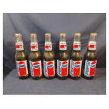 Vintage collectable Richard Petty Pepsi bottles.