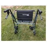 Over sized walker with seat