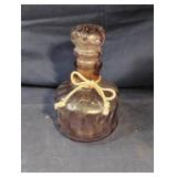 Vintage purple-tinted glass decanter with a
