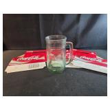 vintage Coca-Cola green glass stein mug features