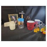 Tupperware measuring cups, coffee mugs, sauers