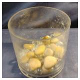 Round vase with clear marbles