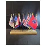 Assorted vintage mini flags with stand