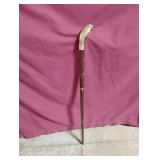 Vintage-style walking cane featuring a solid