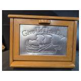 farmhouse-style wooden bread box features a
