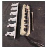 Surge protector, wall hook and nail