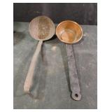 Vintage copper ladle and a metal skimming ladle