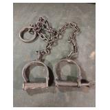 Vintage hand-forged iron wrist shackles with key