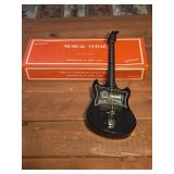 12" musical guitar plays love me tender