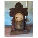 Vintage mantel clock with key. 22 1/2" tall