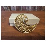 Vintage gold-tone filigree brooch featuring a